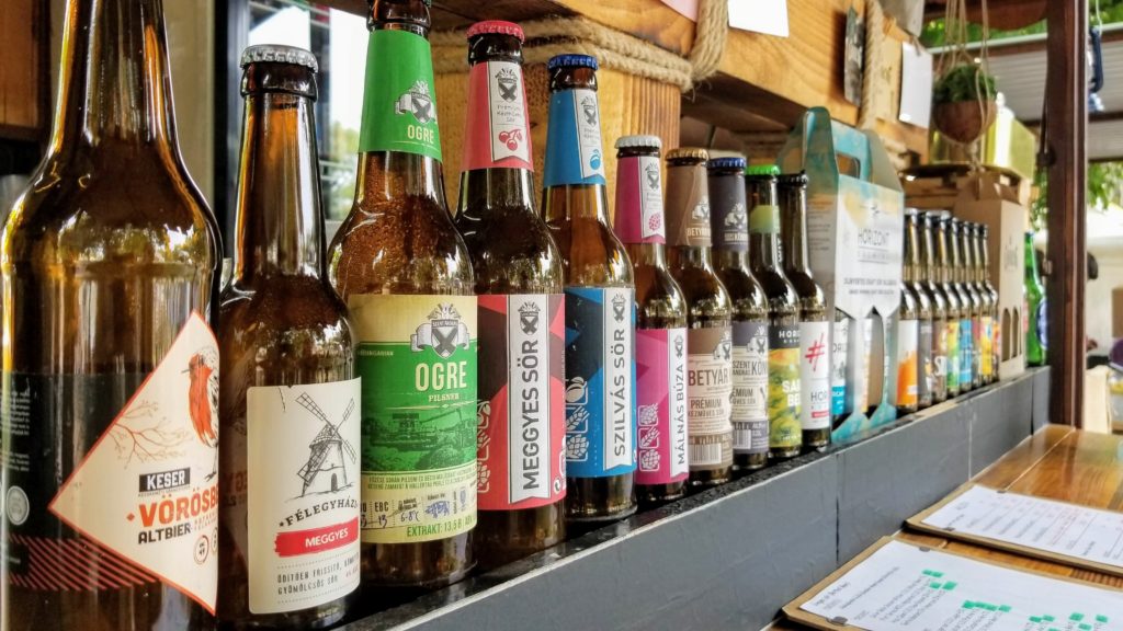 Line of beer bottles on a counter