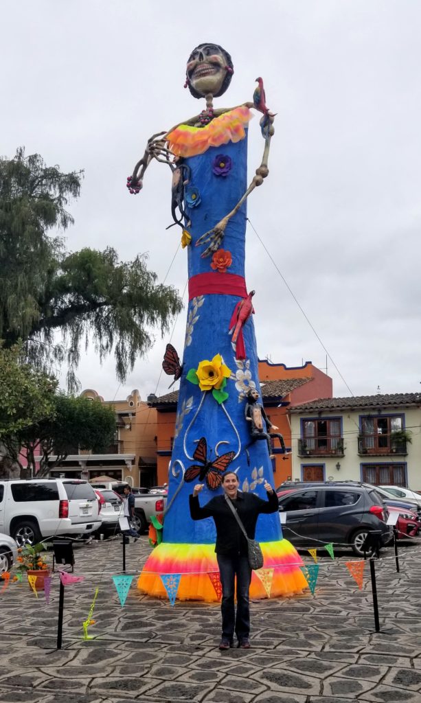 Lis in front of a giant Catrina in Naolinco. No better example of Manifestation.