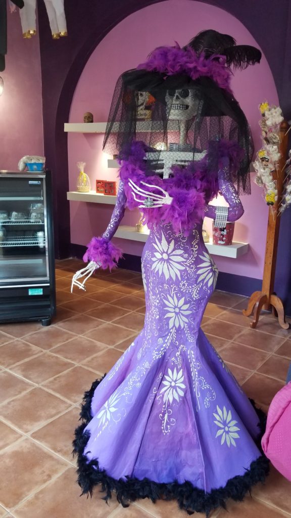 Catrina with a black veil and purple dress. Definitely made this happen with my mind.