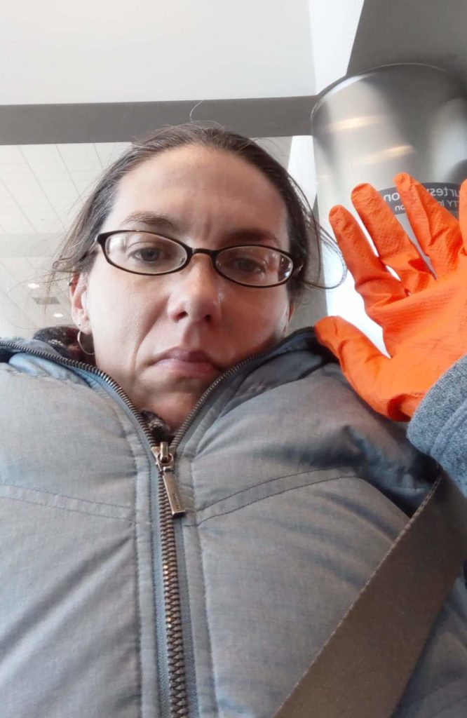 Lis with glasses and orange gloves