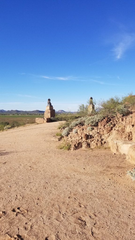 Lion heads at gate.