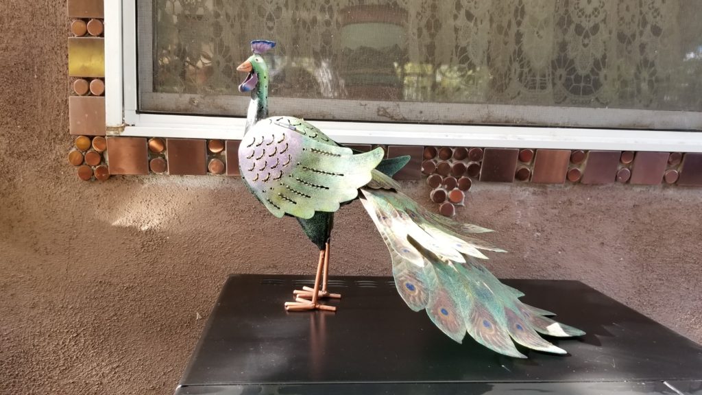 Metal peacock.