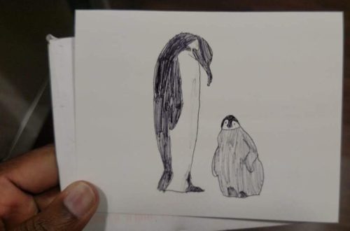 Note card with illustrated penguins.