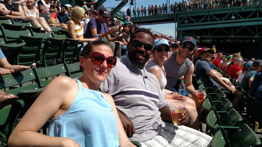 friends in the stands at Fenway park