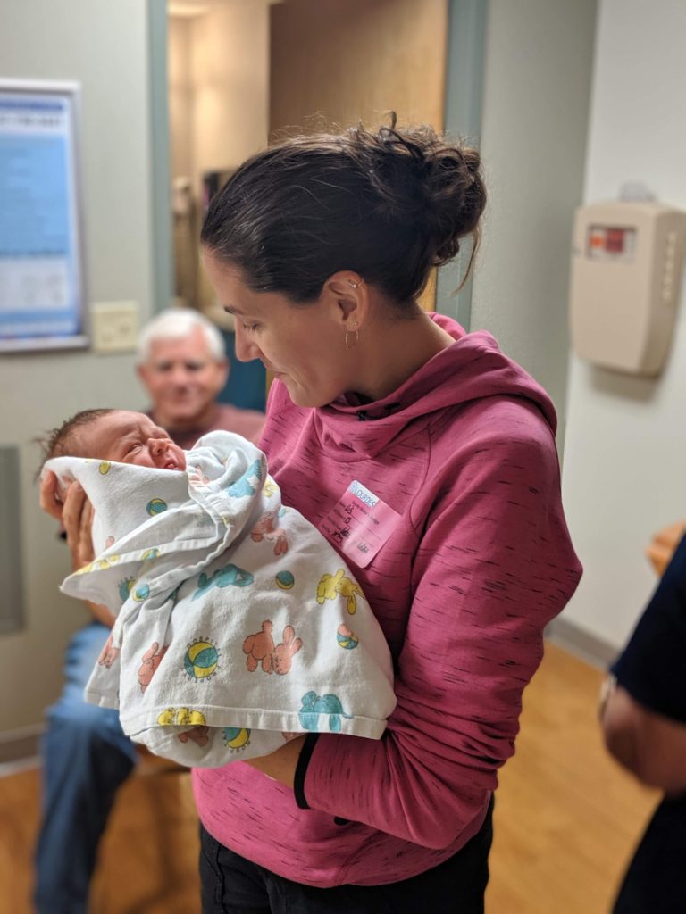 Lis holding her baby nephew