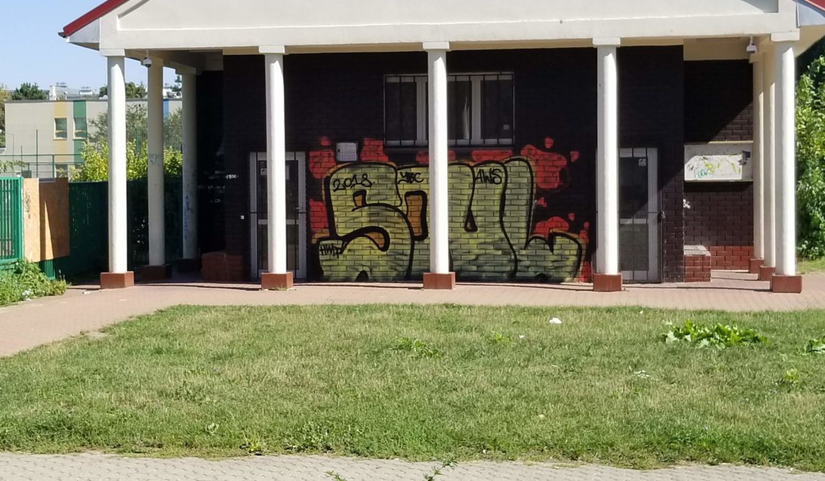 graffiti on brick wall that reads "soul"